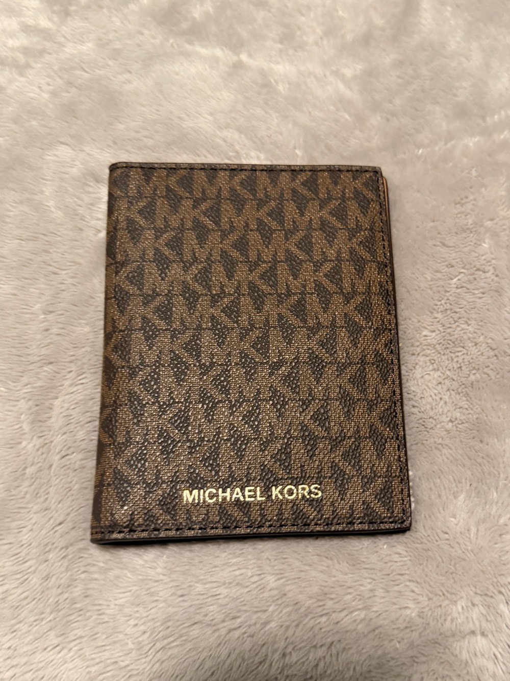 Michael Kors Jet Set Travel Passport Wallet in the Signature MK Brown pattern